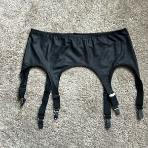 One size black garter with adjustable eyelets